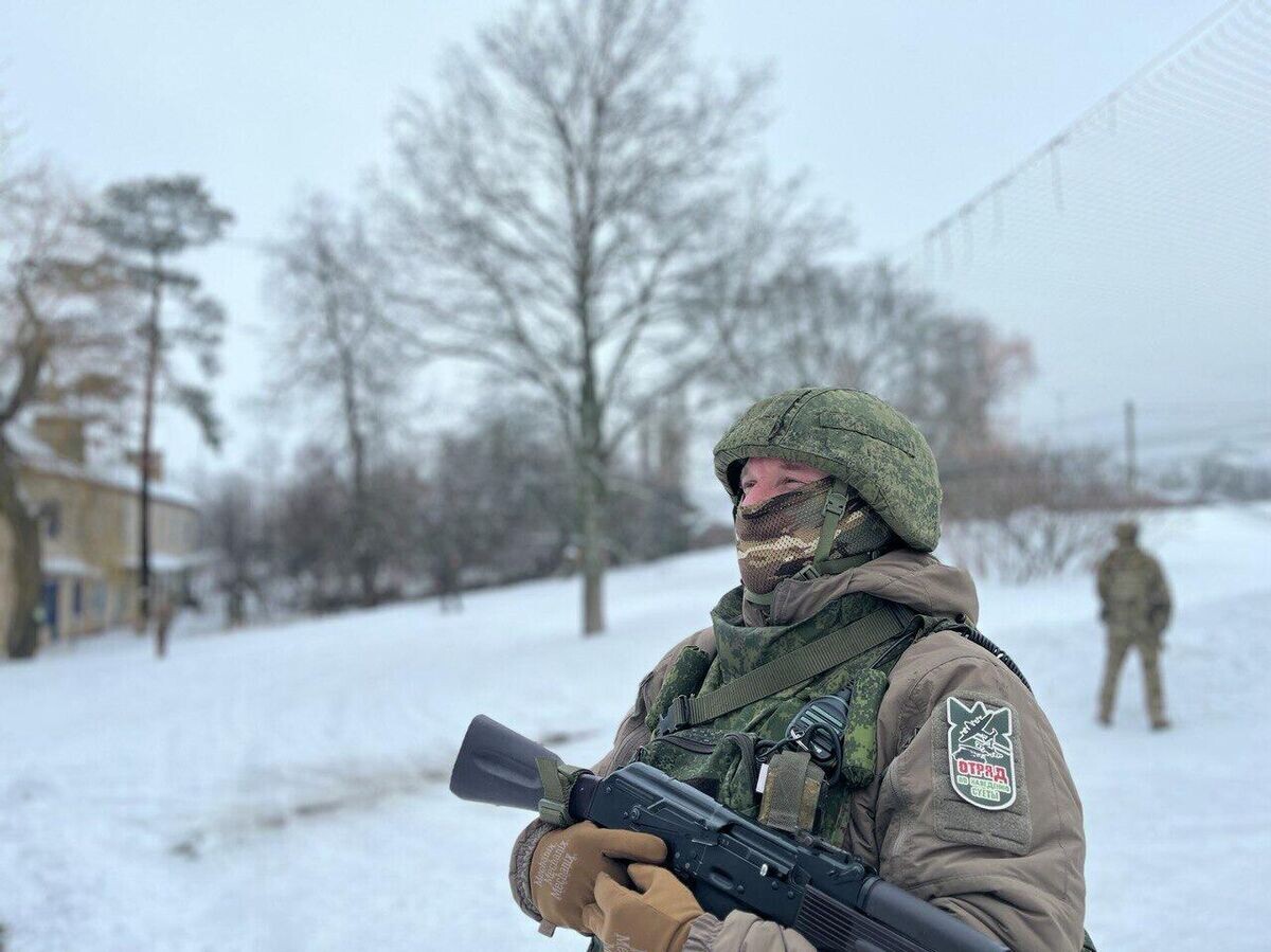    Командир отделения Озон на месте гибели сослуживца | © РИА Новости / Михаил Кевхиев