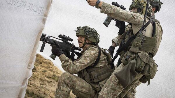    © Photo : Lietuvos kariuomenė / Aušrinė Zajankauskaitė