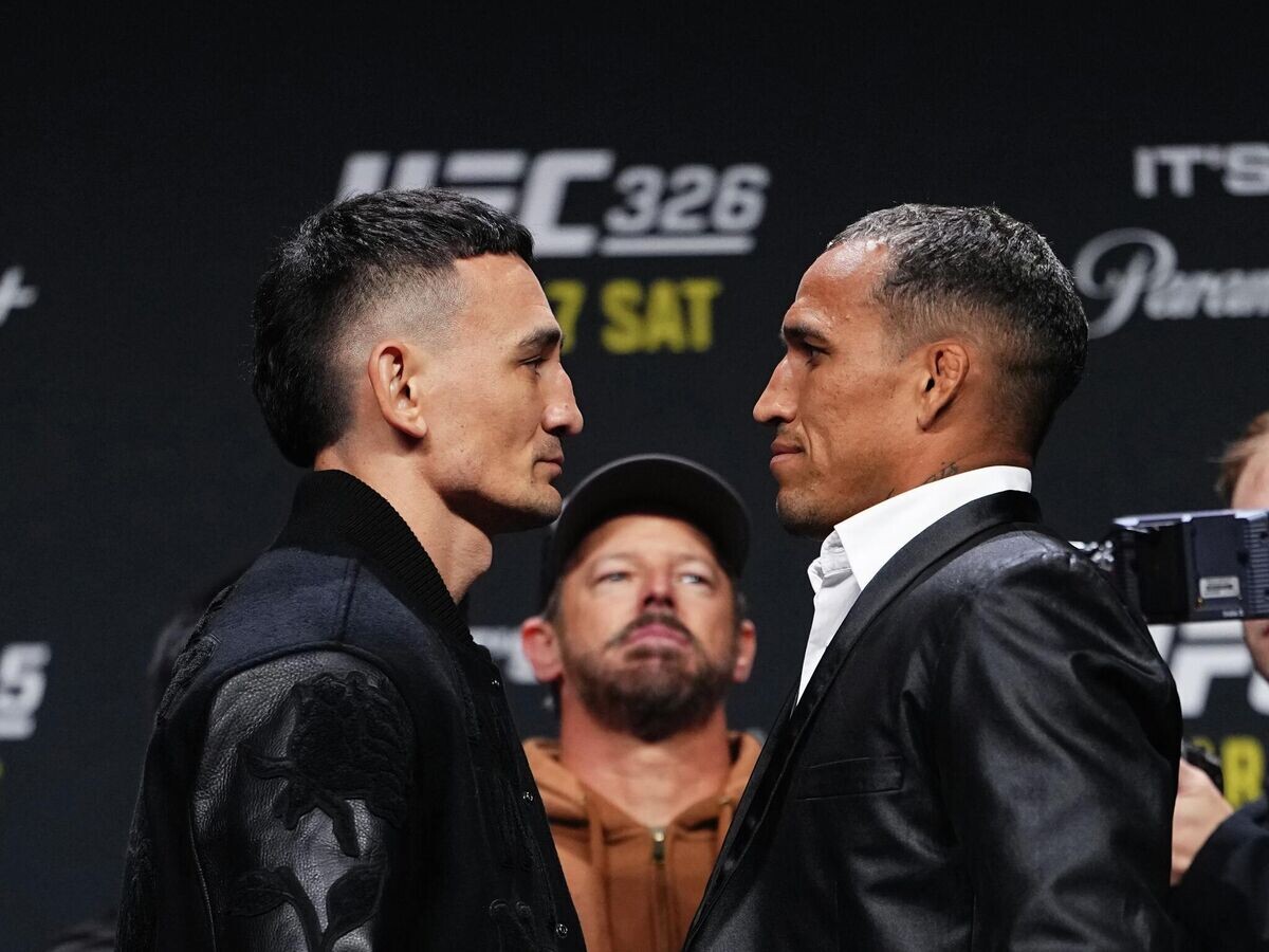    Макс Холлоуэй и Чарльз Оливейра | © Getty Images / Jeff Bottari