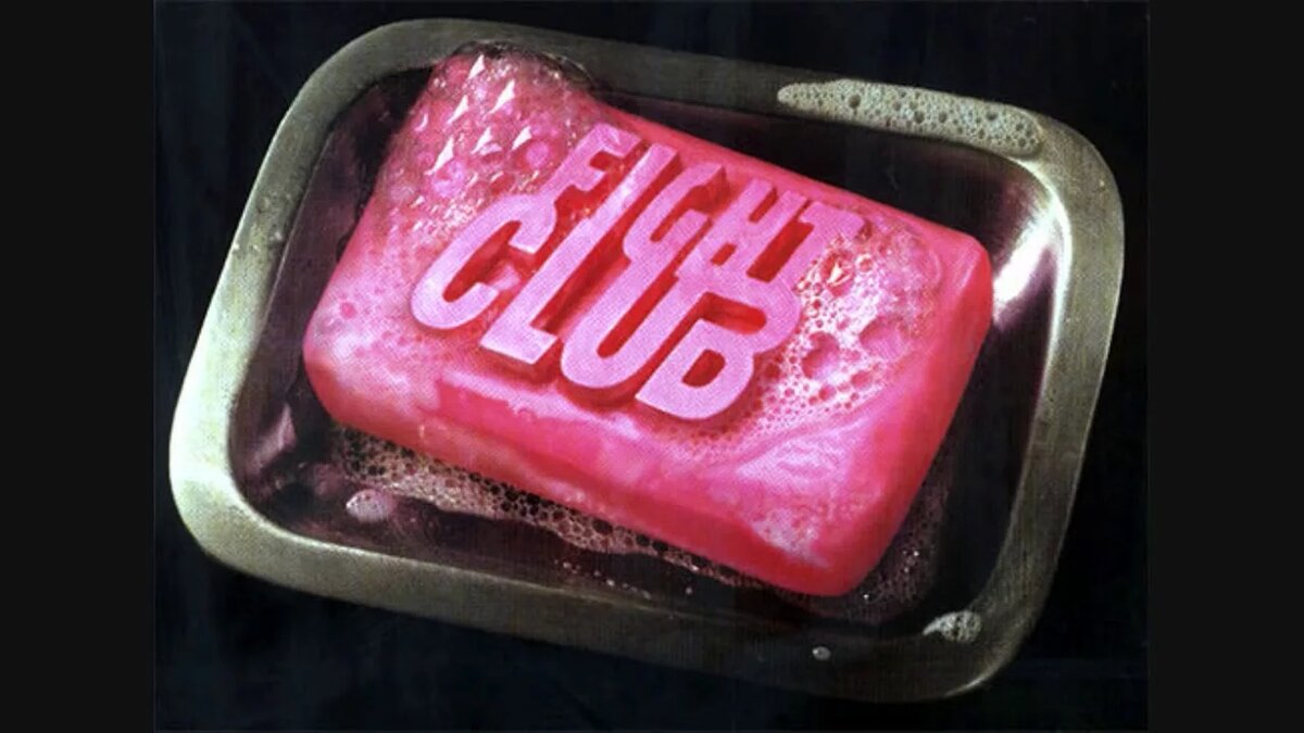 Кадр с мылом (розовый брусок с надписью Fight Club).