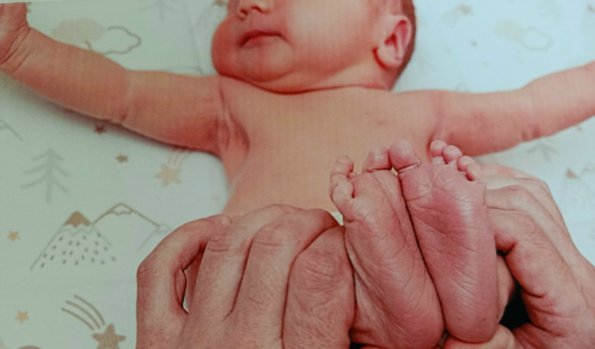 Человек родился.  Личное фото.