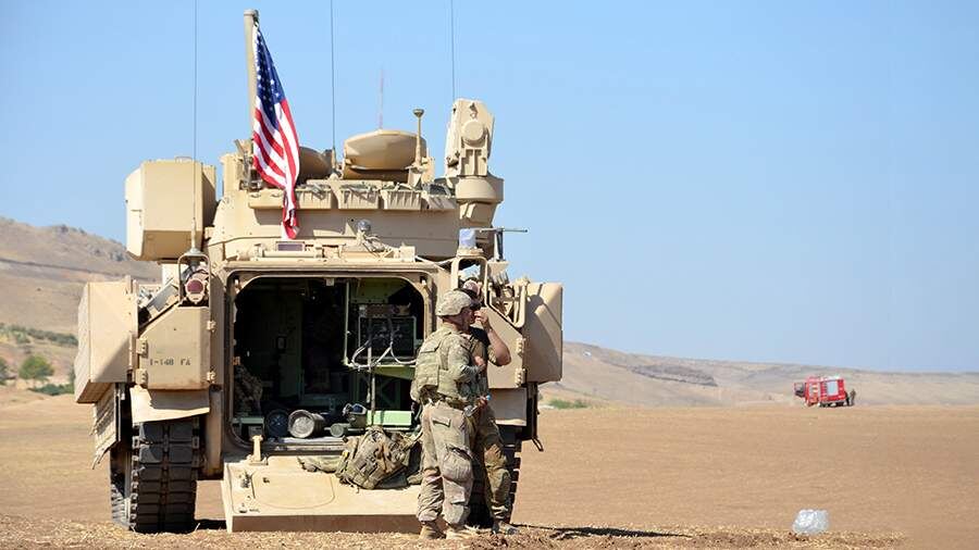    Фото: TASS/EPA/AHMED MARDNLI