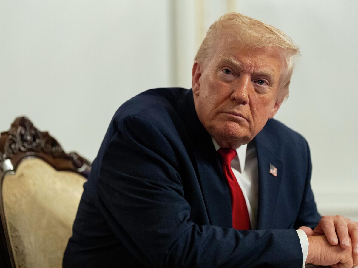    Президент США Дональд Трамп во время прямой линии с военными базами по случаю Дня благодарения | © AP Photo / Alex Brandon