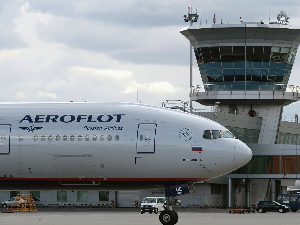    Самолет Boeing 777 авиакомпании "Аэрофлот" в международном аэропорту "Шереметьево".© РИА Новости . Максим Блинов