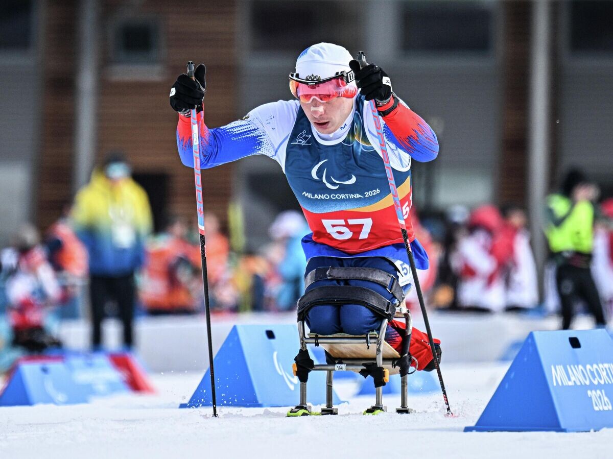    Иван Голубков на дистанции гонки на 10 км с интервальным стартом, в классе LW 10-12 среди мужчин на XIV зимних Паралимпийских играх на лыжном стадионе Тесеро | © РИА Новости / Юрий Кочетков