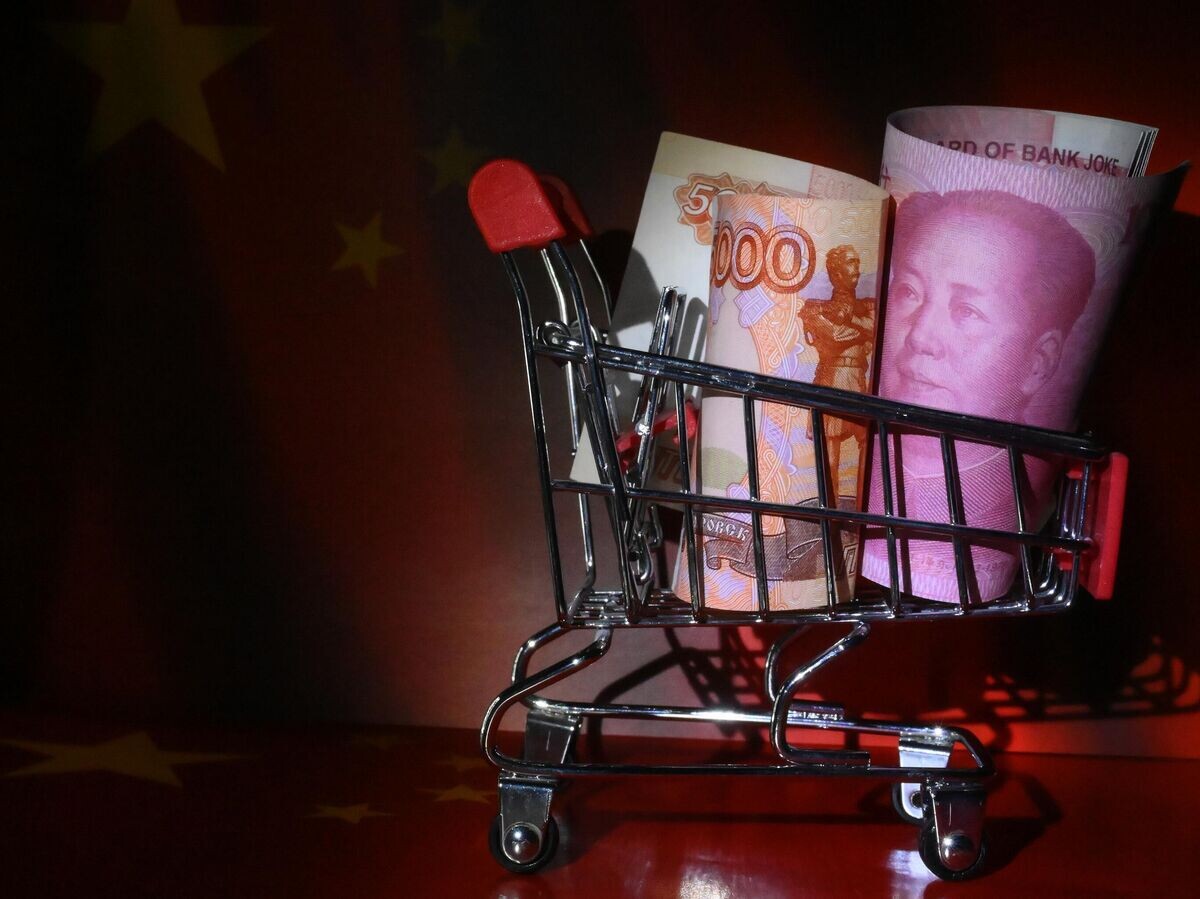    Банкноты китайских юаней и российских рублей© РИА Новости . Илья Питалев