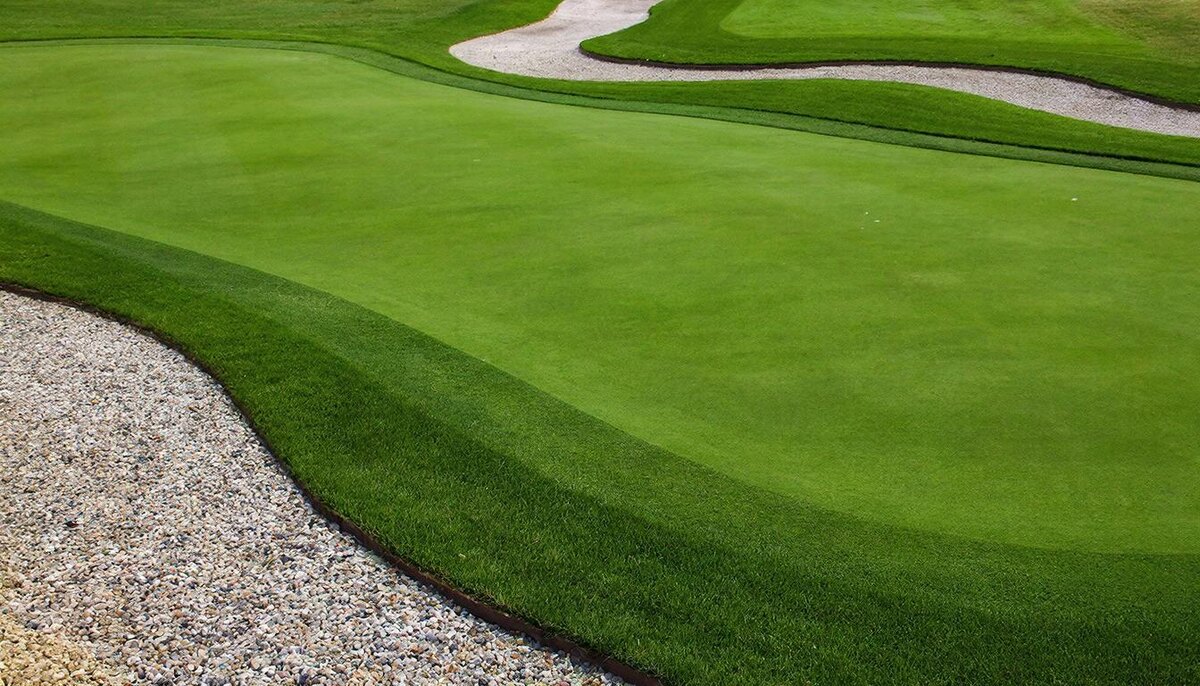 Отсыпка декоративными камнями участков газонов