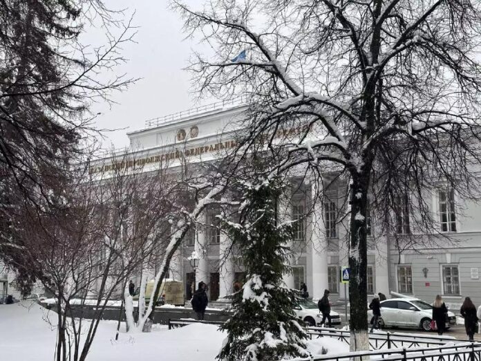    The 'Max' application, circa 2028, representing the digital fortress that has effectively ended student academic freedom.