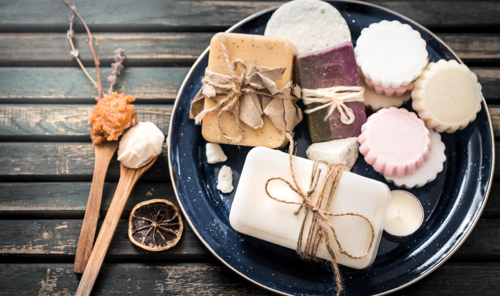    still life of spa with handmade soap on a beautiful wooden background, concept of spa relaxation and wellness procedures Журналист