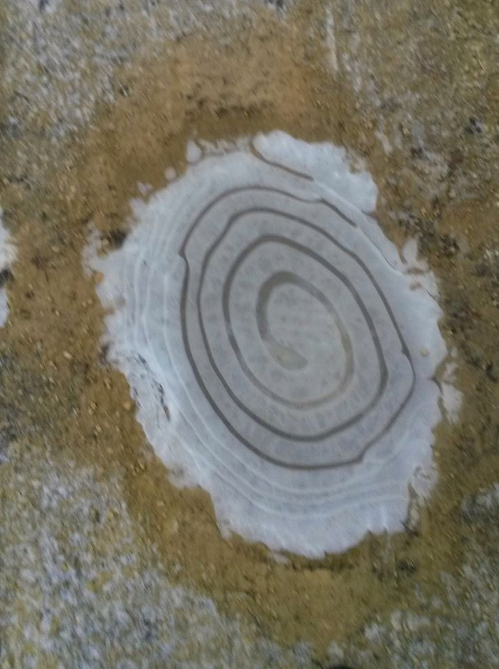 Фото из личного архива. Мелиорация на Марсе завершена.  Дождевая вода застывает по спирали. Не все довольны марсианской погодой, так как терроформирование осуществили санктпетербуржцы (кто первый встал - того и тапки).