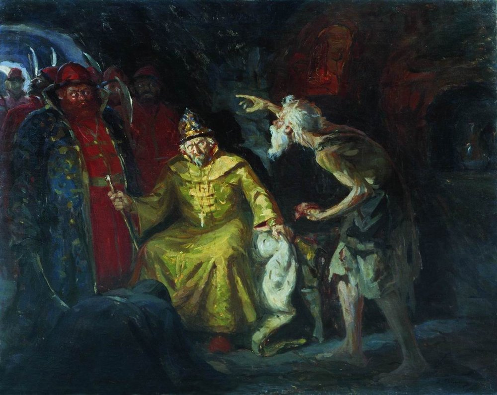 Рябушкин А. П. Иоанн Грозный с приближенными. 1903 год. На полотне юродивый Николай Салос предлает царю Иоанну Грозному кусок сырого мяса, обличая его в кровожадности.