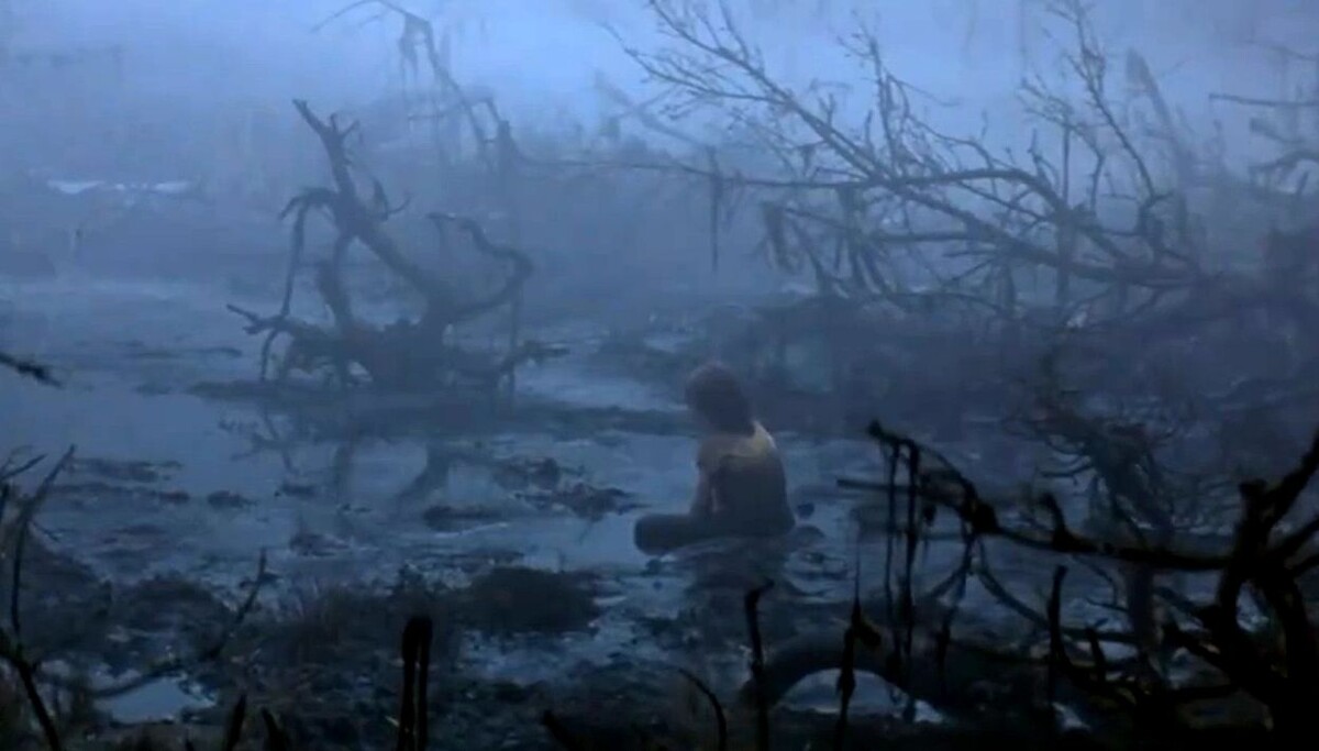 Идти я больше не мог и сел прямо в воду.  Изображение из к/ф "Бесконечаня история".