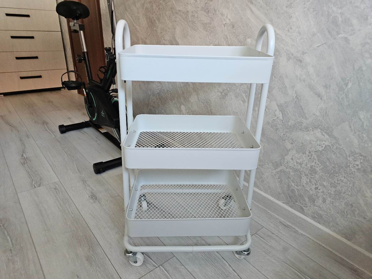 Расстояние  между  полками этажерки 