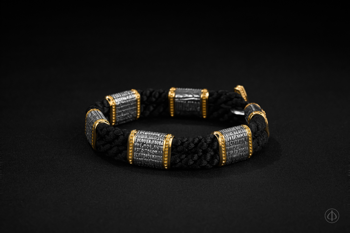 Браслет из серебра и золота 585 на шнуре Арт.016