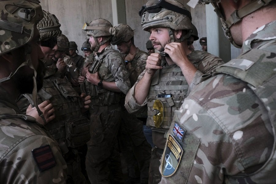 Военнослужащие Великобритании во время военных учений стран НАТО - Фото: VALDA KALNINA/EPA/TASS