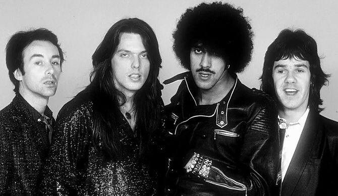 Thin Lizzy, слева-направо: Брайан Дауни, Скотт Горэм, Фил Лайнотт и Гэри Мур