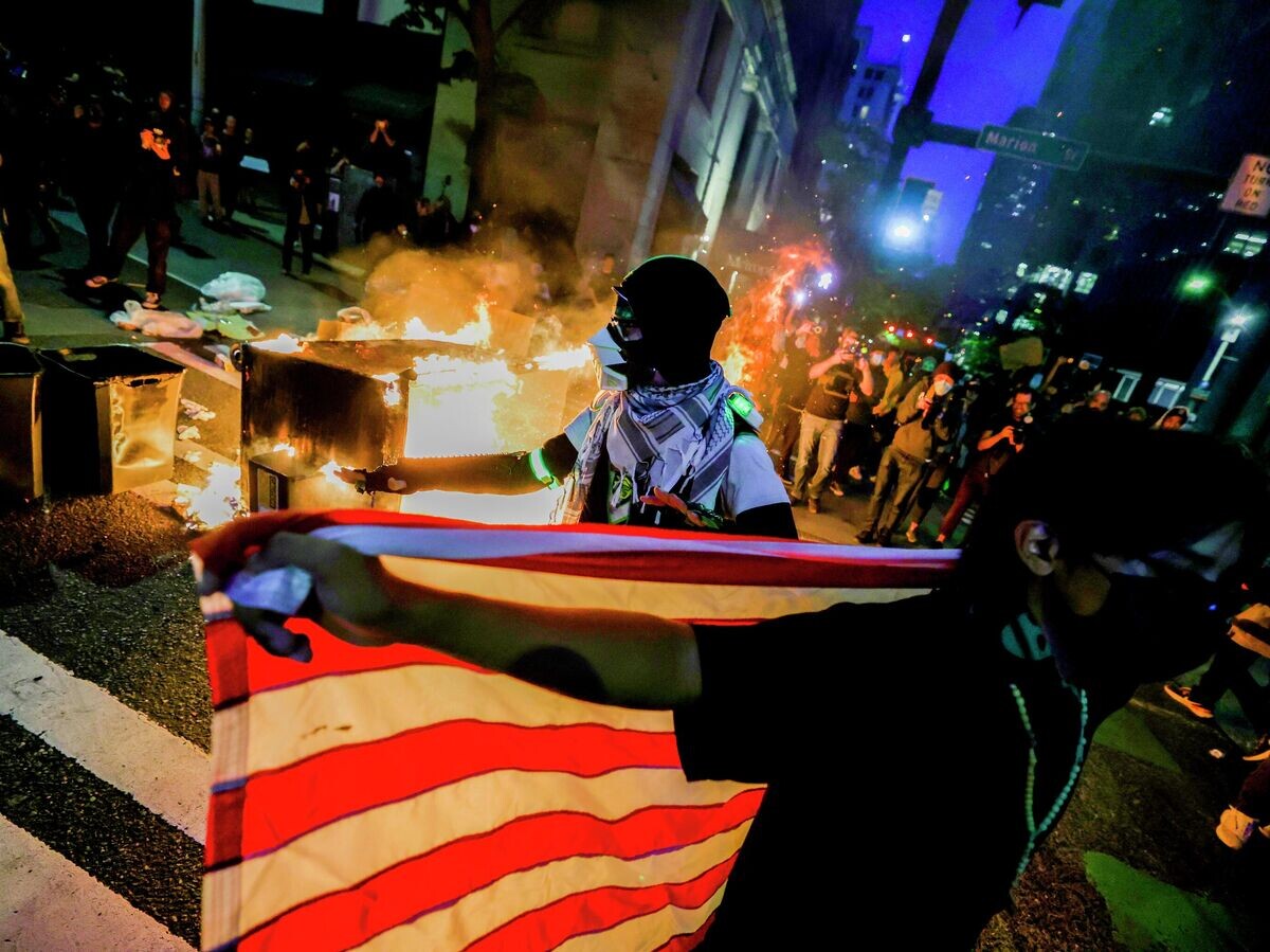    Протесты против миграционной политики в Сиэтле, США | © AP Photo / Ryan Sun