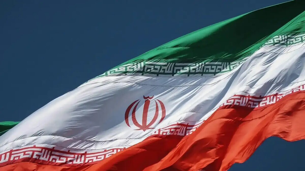    Флаг Ирана. © unsplash.com / sina drakhshani