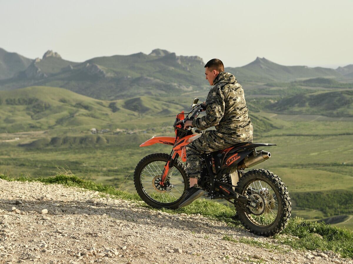    Мужчина на питбайке | © РИА Новости / Константин Михальчевский