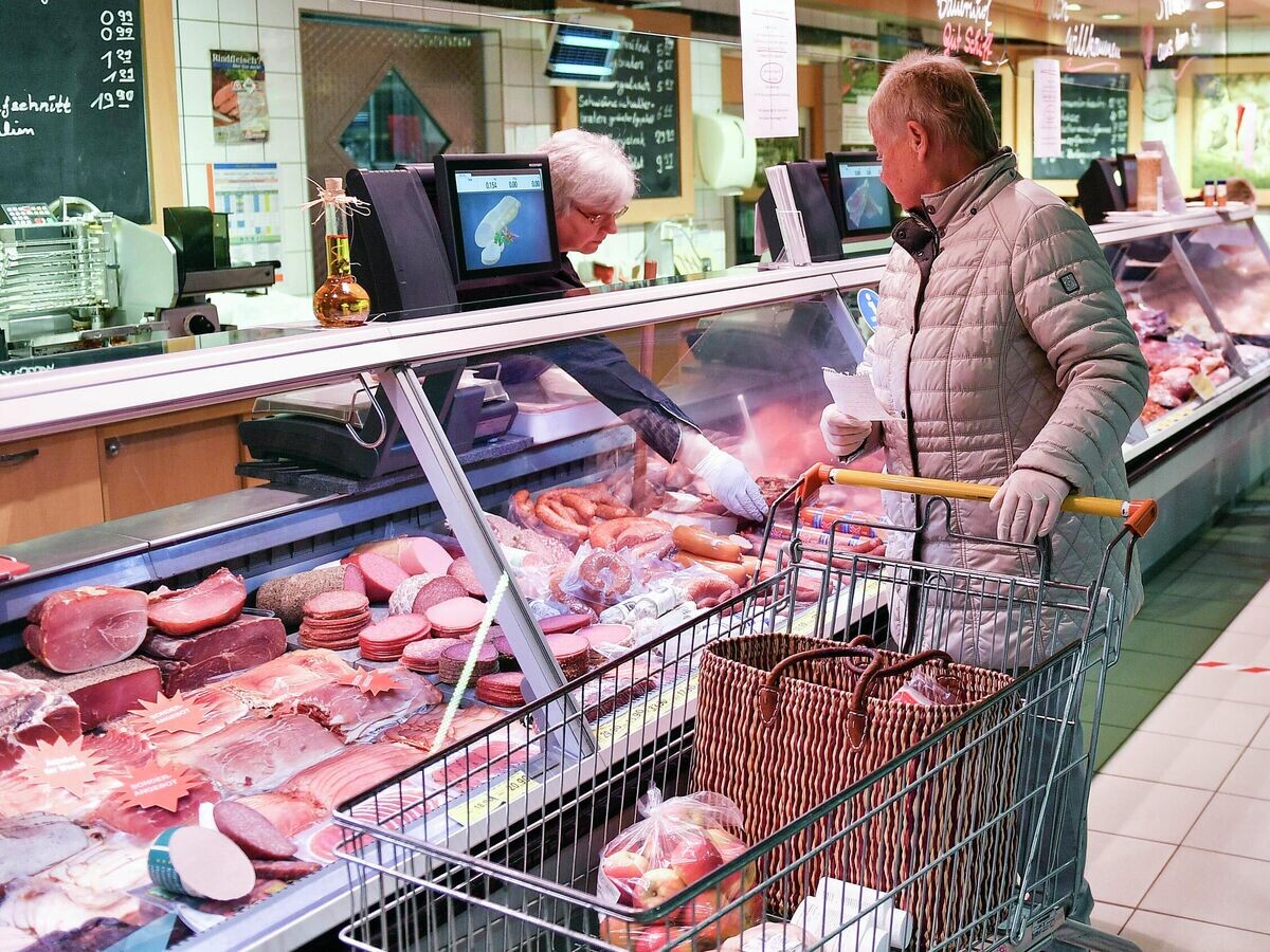    Женщина в супермаркете в Германии | © AP Photo / Martin Meissner