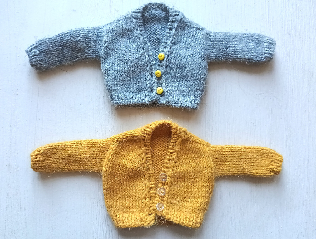 Серый кардиган из Fabel Drops, цвета охры из Nord Drops