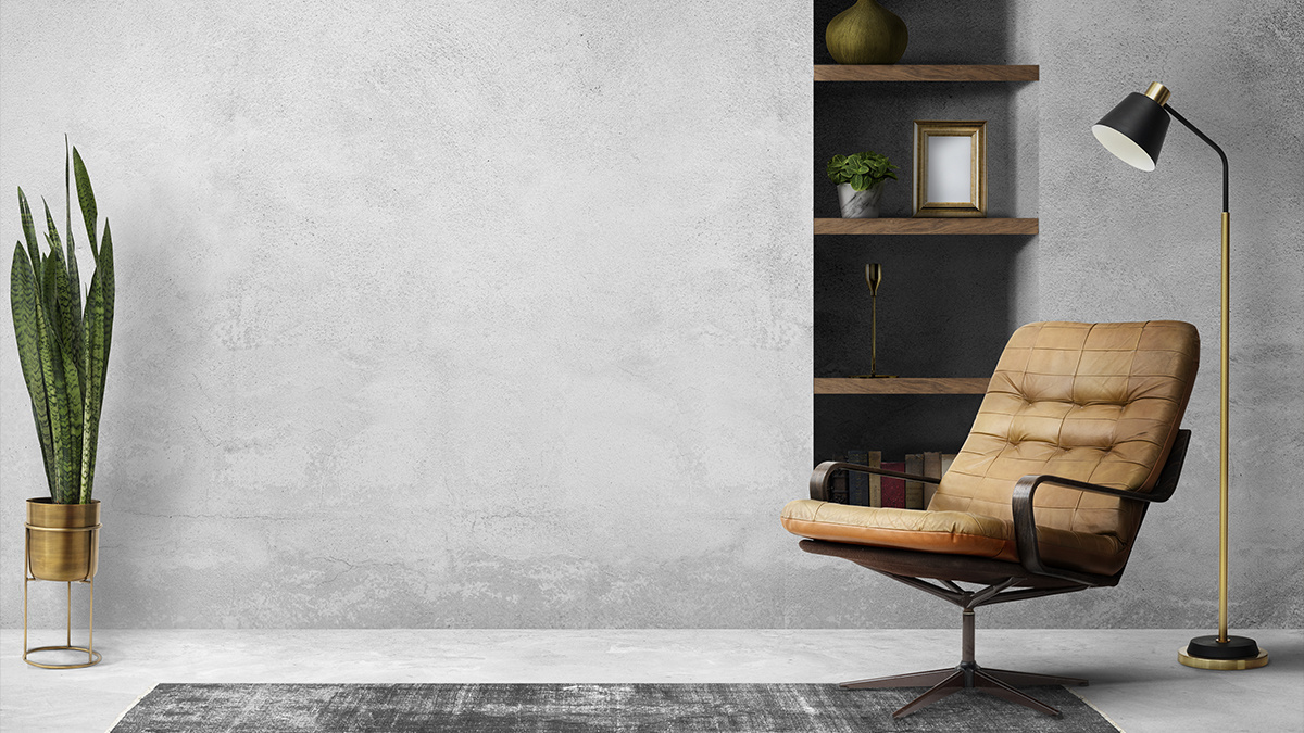 Холодный серый фон и тёплые акценты — формула уютного лофта. Здесь это кожаное кресло, деревянные полки и металлическое кашпо с цветком. 