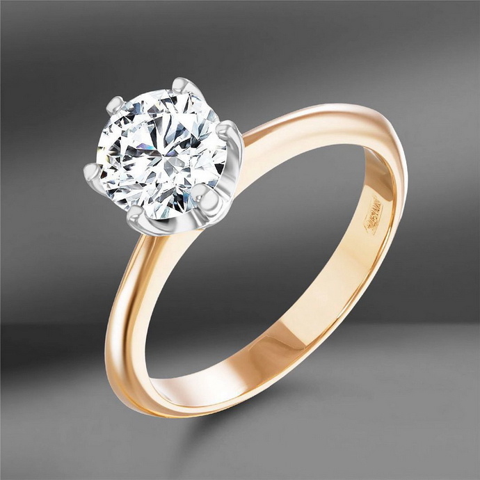 Золотое кольцо с одним центральным бриллиантом круглой огранки − лаконичная модель помолвочного кольца
