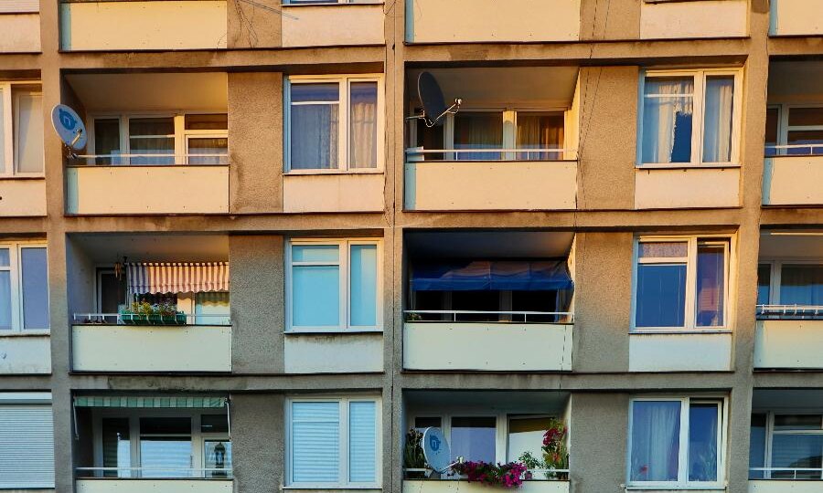 Не повод беспокоиться. Появление в адресе литеры не требует замены всех документов