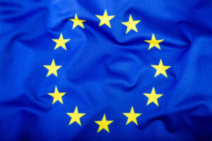    European Union and Greece. The concept of relationship between EU and Greece. Waving flag of EU and Greece.
