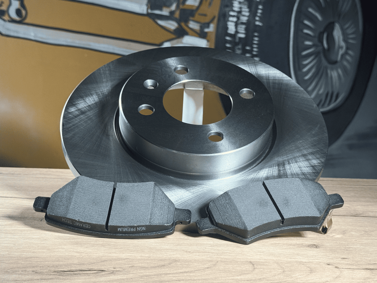 Новый тормозной диск и колодки