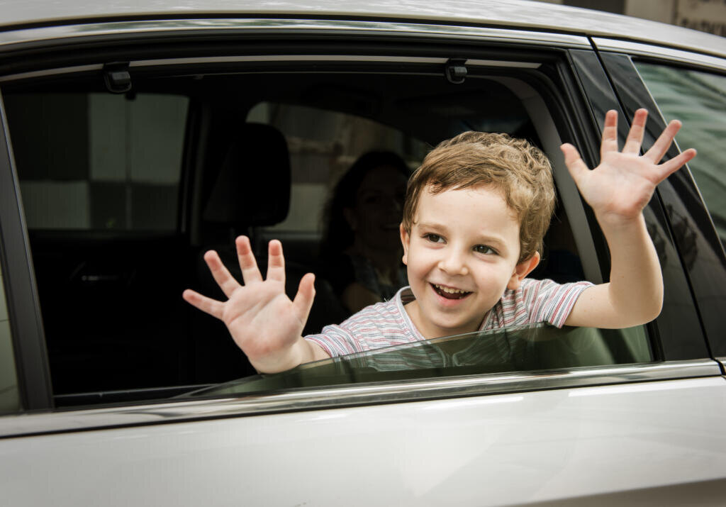    Boy CHild in Car Cheerful Smiling Greeting Журналист