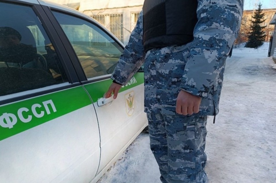    Сотрудники УФССП России по Томской области готовятся к выезду. Фото: пресс-служба ведомства