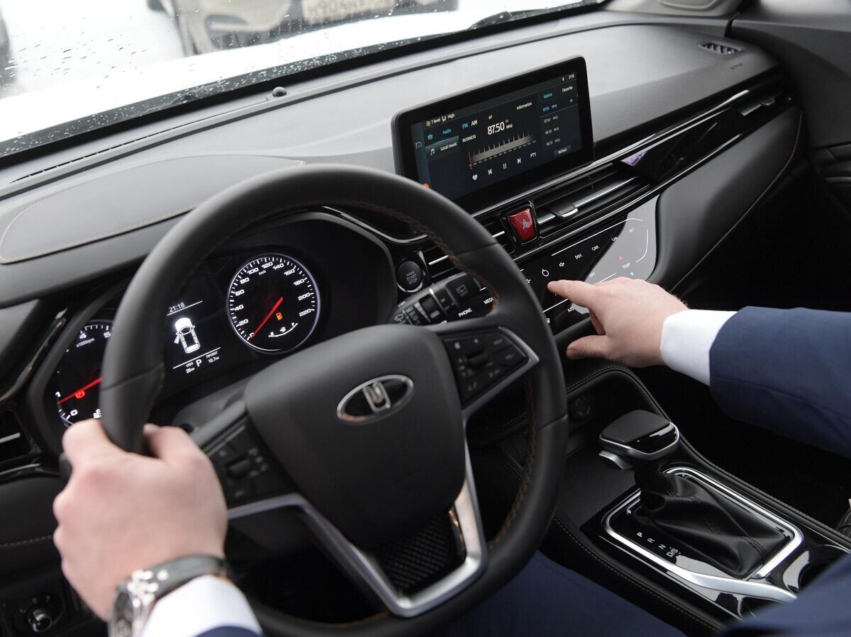    Водитель за рулем автомобиля© РИА Новости . Алексей Никольский