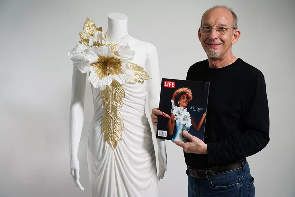 Дизайнер  Юджин Штутцман