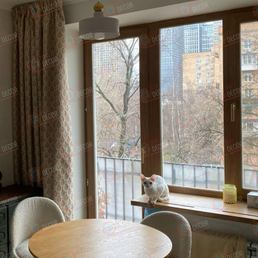 На фото: была произведена оклейка балконного профиля под дерево