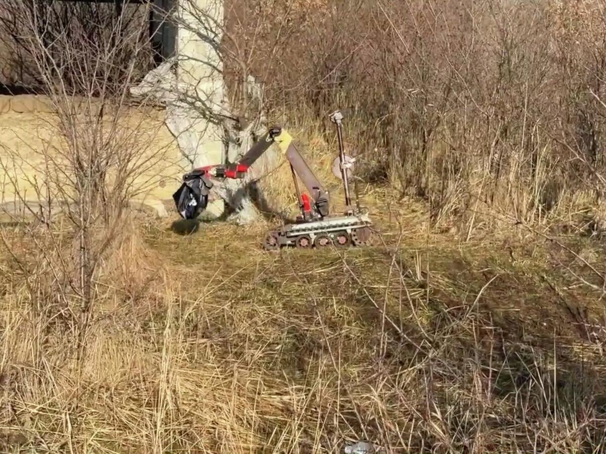    Момент подрыва киевским куратором своего агента, когда того задерживали силовики | © fsb.ru