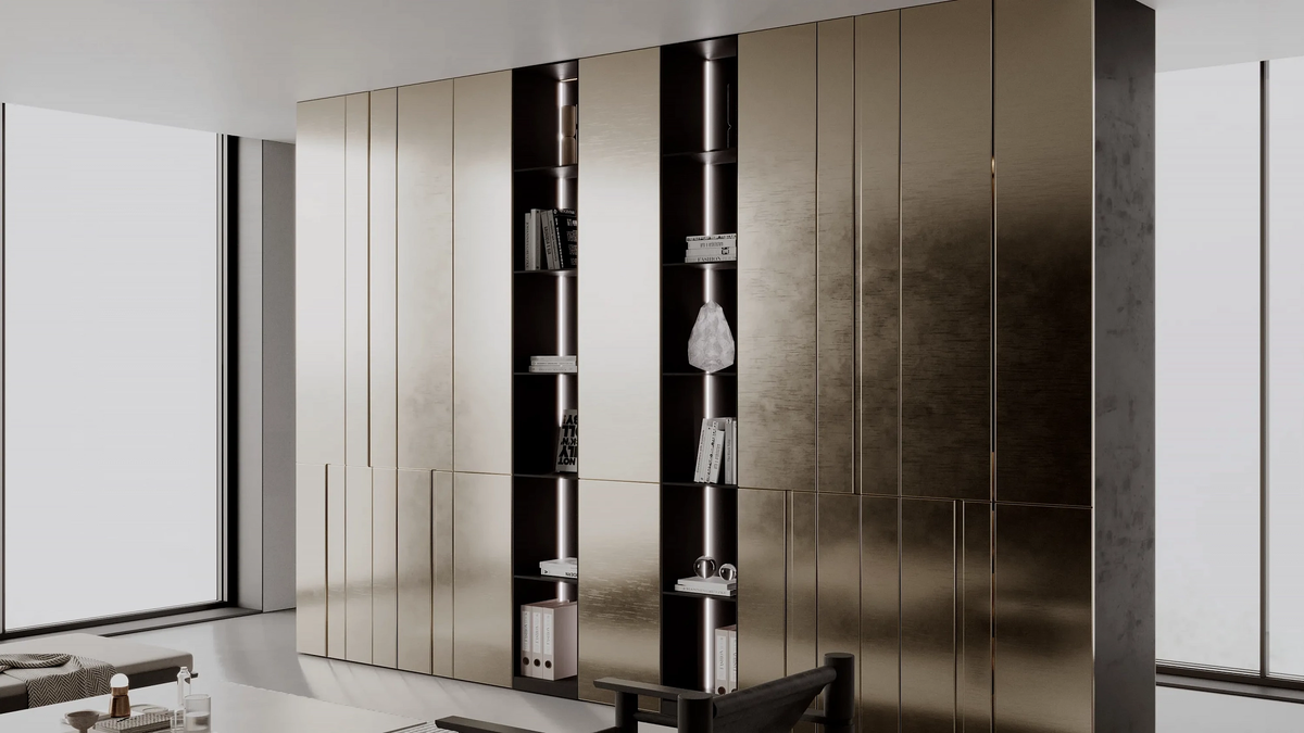 Шкаф "Бохум" из МДФ с металлическими фасадами в цвете латунь. Поверхность обработана по уникальной технологии "жидкий металл" и окрашена в цвет латуни — теплый, глубокий, с переливами от нежно-золотистого до почти медного, в зависимости от угла падения света.
