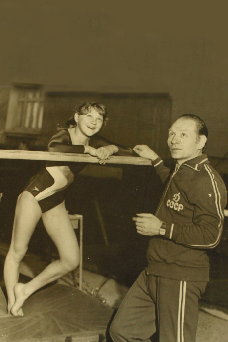    С тренером, который стал для неё второй семьёй.