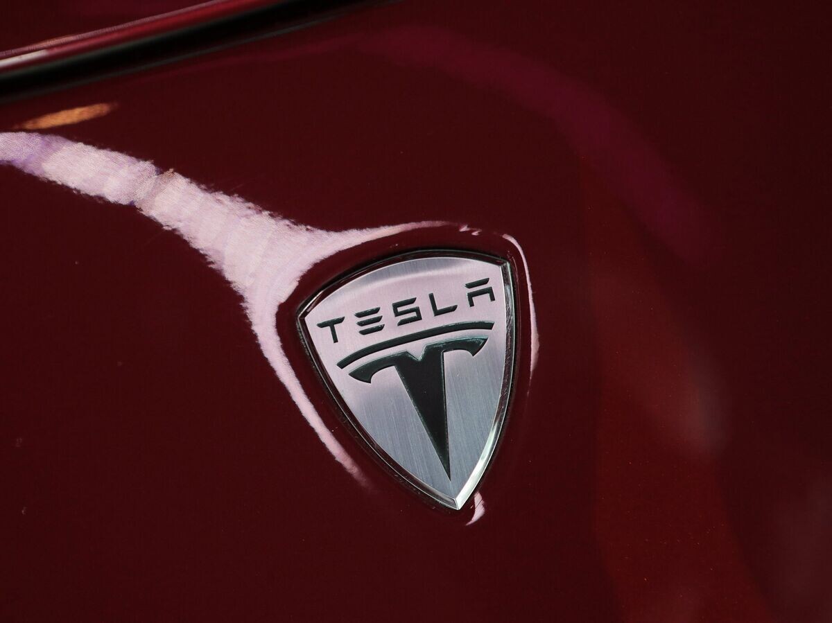    Автомобильный салон Moscow Tesla Club© РИА Новости . Виталий Белоусов