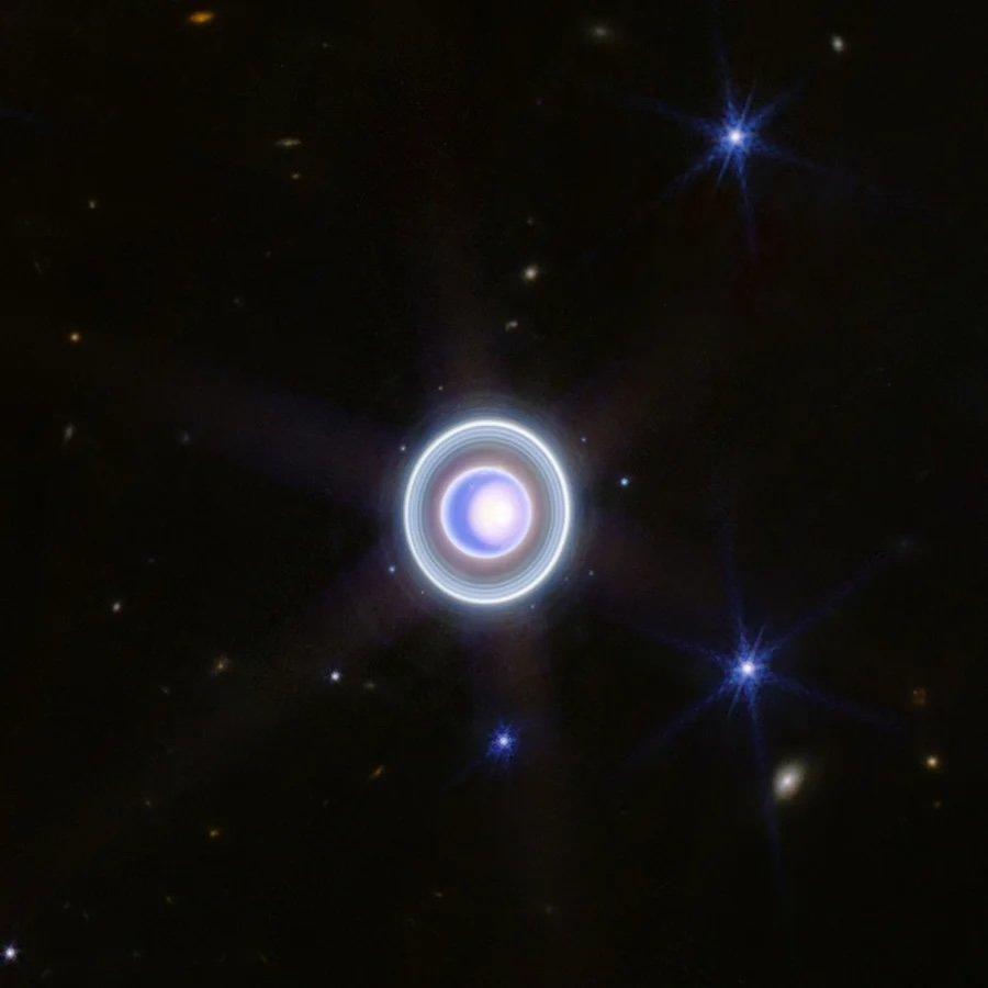 Фотография Урана и его колец в инфракрасном диапазоне, сделанная космическим телескопом Джеймс Уэбб (NASA, 2023 год)