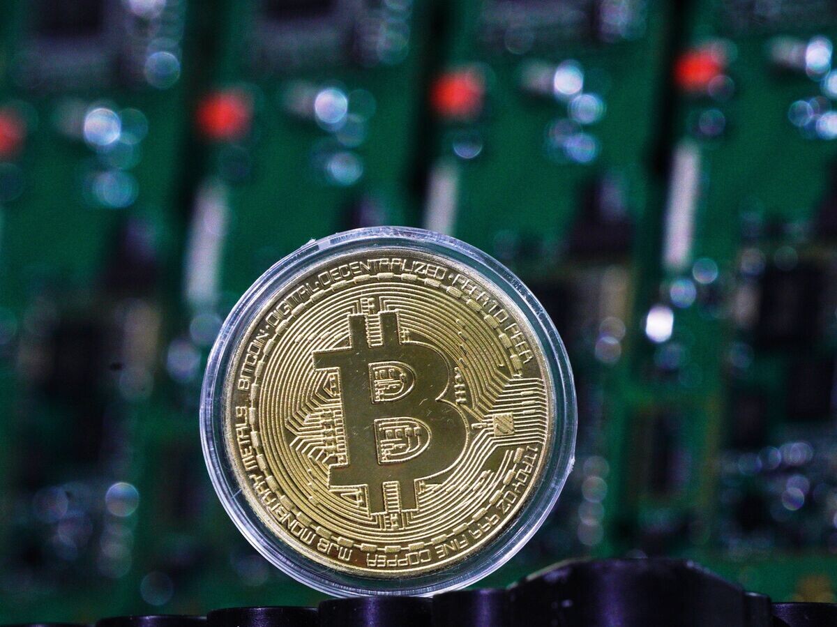    Биткоин© РИА Новости . Владимир Астапкович