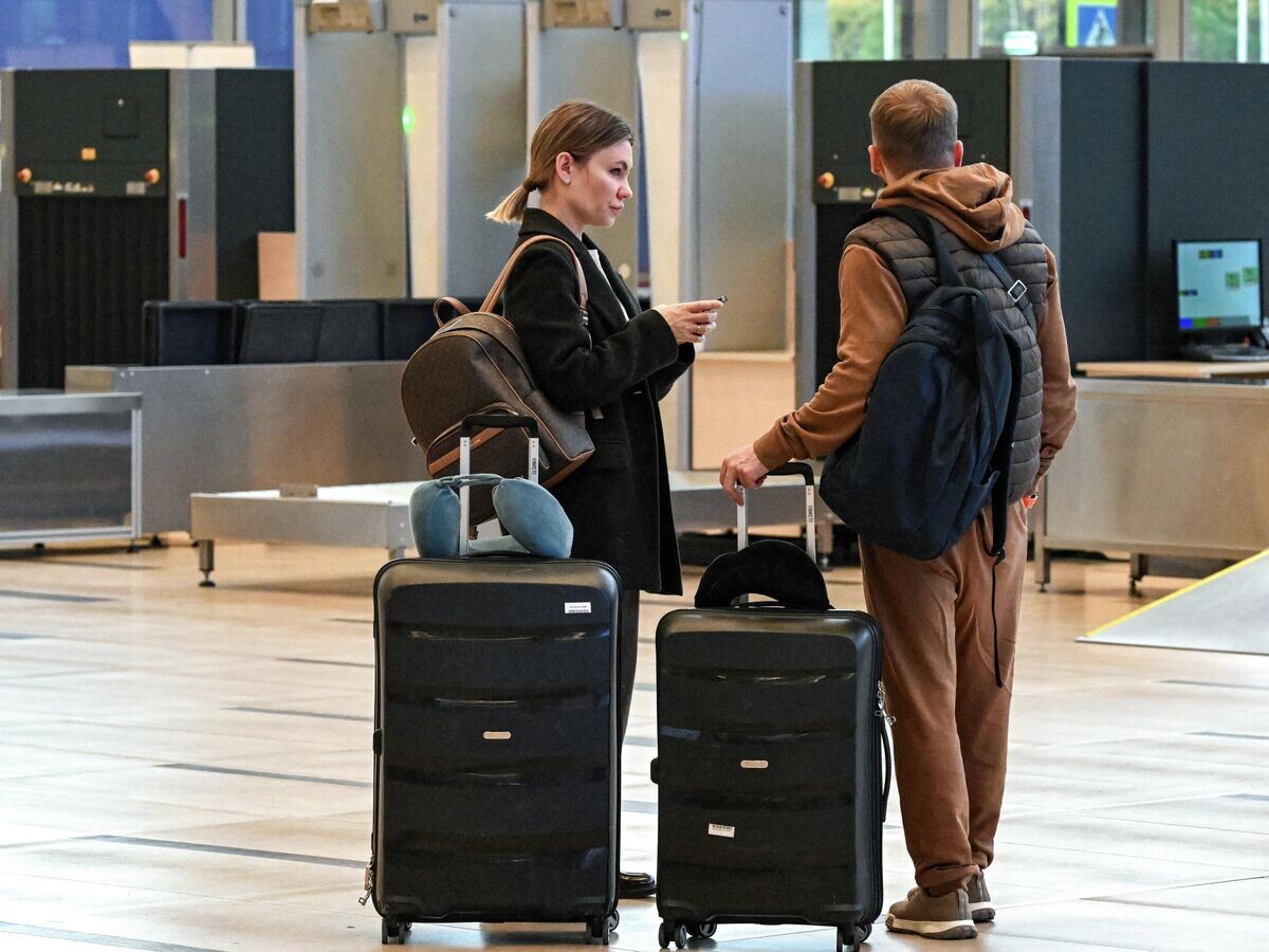    Туристы в аэропорту | © РИА Новости / Илья Наймушин
