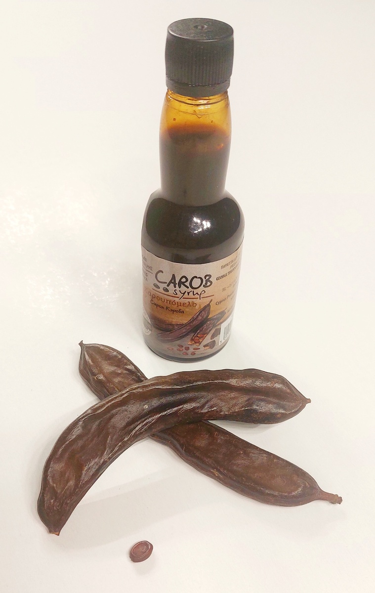 Плоды-бобы, сироп из плодов цератонии стручковой и семя массой 1 карат