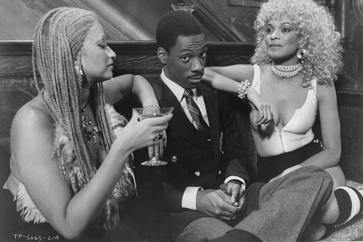    Мишель Маис, Эдди Мерфи и Барра Кан на съемках фильма "Поменяться местами"   
Paramount Pictures/Getty Images