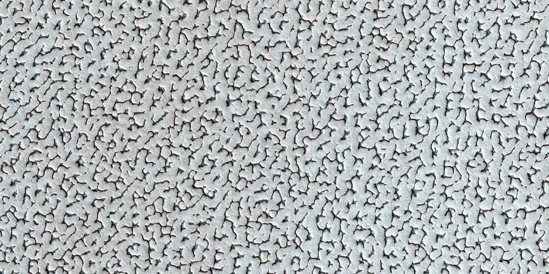 Загадочный узор льда на северной полярной шапке Марса