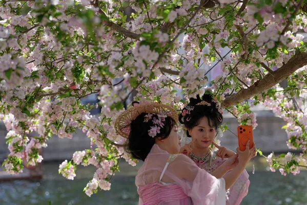 © AP Photo / Andy Wong