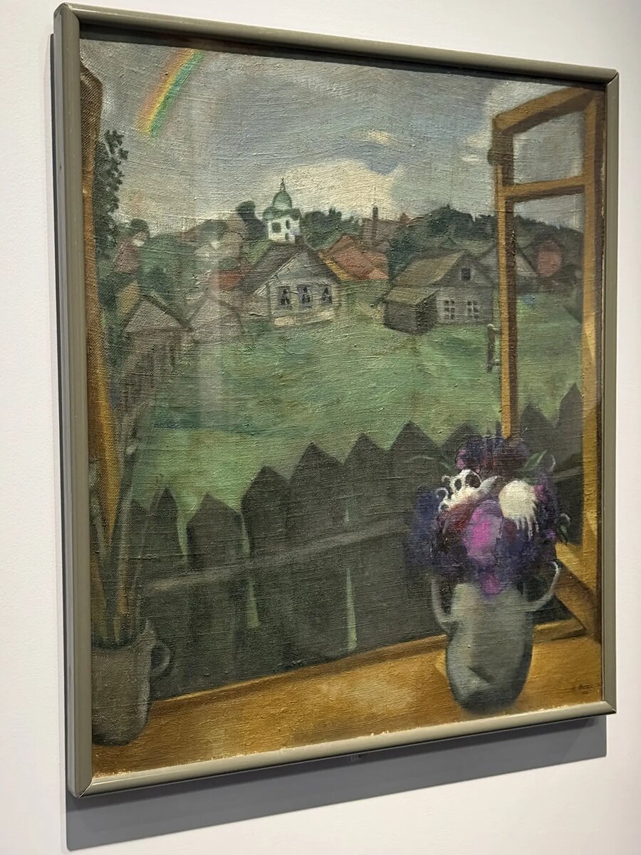 Излюбленный прием Шагала - изображать город как пейзаж за окном