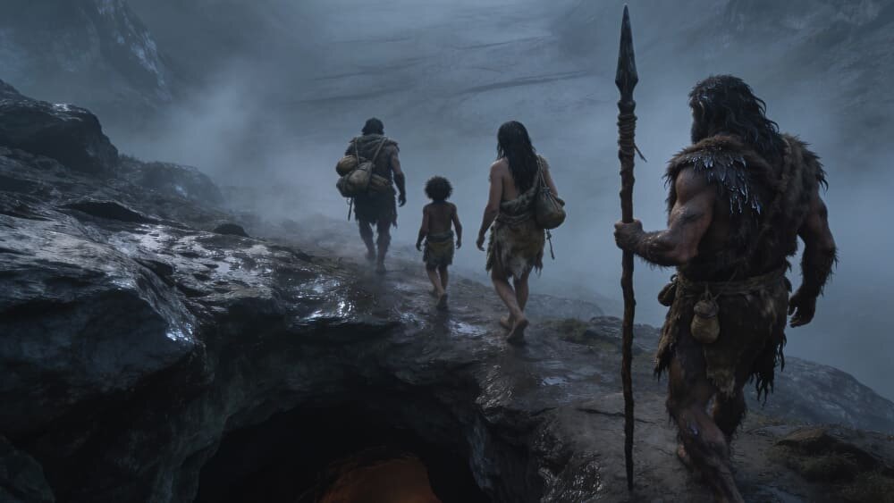 На фотографии изображены древние люди в звериных шкурах, идущие по скалистой местности в тумане, один из них держит копье, рядом виден вход в пещеру. Изображение сгенерировано в ИИ для иллюстрации идеи.