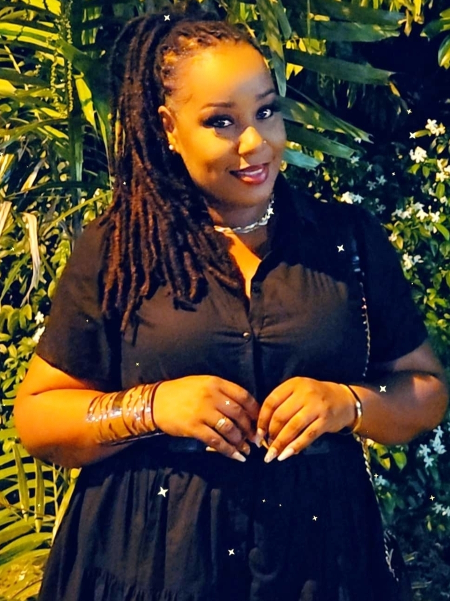 Тринидадская певица Натали Дуглас (Natalie Douglas aka Mua Nats), экс-участница трио Holy Triniti