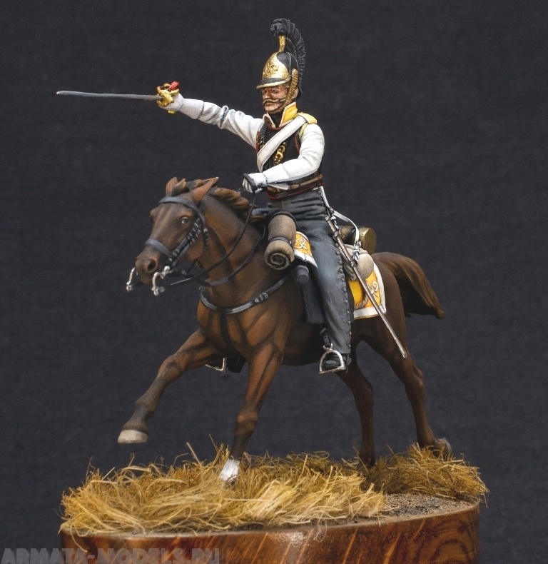 Рядовой армейских кирасирских полков. 1812 - 1814. 54 мм. Материал - белый металл. Chronos Miniatures, 54 мм. Ссылка: https://arma-models.ru/catalog/miniatury/chm_54234_m_ryadovoy_armeyskikh_kirasirskikh_polkov_rossiya_1812_14_gg_54_mm_material_belyy_metall/ Цвета обмундирования соответствуют Астраханскому кирасирскому полку. Для справки:  При общей кирасирской форме Астраханский полк имел желтый приборный цвет и белый приборами металл. Источник: Русская армия 1812 года : [Изоматериал] Выпуск 2 / Худож. и авт. аннот. О. К. Пархаев ; Авт. вступ. ст. А. А. Смирнов ; Рец. А. М. Горшман, В. Н. Куликов ; Ред. А. Г. Тюрин, Л. А. Трепцова. — Москва : Изобразительное искусство, 1988. — 32 л. в обл. : офсет : 14,8 х 10,6 см. Ссылка: https://litlife.club/books/21398/read?page=2 Для справки: 12.10.1811 — генерал-майором Бороздиным 2-м в м. Усвяты Велижского уезда Витебской губернии из офицеров и нижних чинов, отделённых от лейб-кирасирского Его Величества, лейб-кирасирского Её Величества, Екатеринославского кирасирского, Рижского, Казанского, Ямбургского, Нежинского, Псковского, Московского, Финляндского и Митавского драгунских, Гродненского, Елисаветградского и Изюмского гусарских полков сформирован Астраханский кирасирский полк в составе 5-ти эскадронов (ПСЗ, XXXI, 24808). Ссылка: https://ru.wikipedia.org/wiki/Астраханский_8-й_драгунский_полк 12 октября 2026 года исполняется 215 лет со дня сформирования Астраханского кирасирского полка.